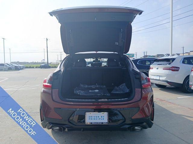 used 2025 BMW X4 car, priced at $57,191