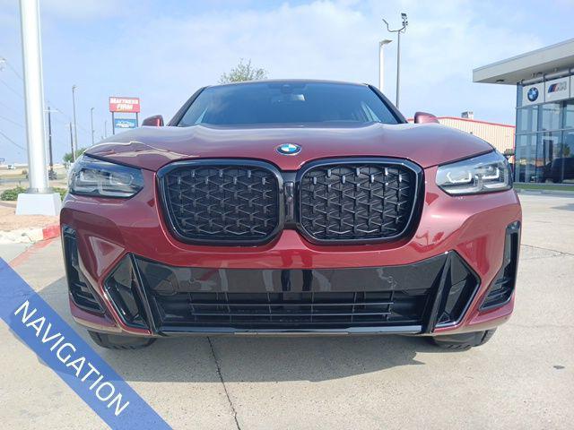 used 2025 BMW X4 car, priced at $57,191