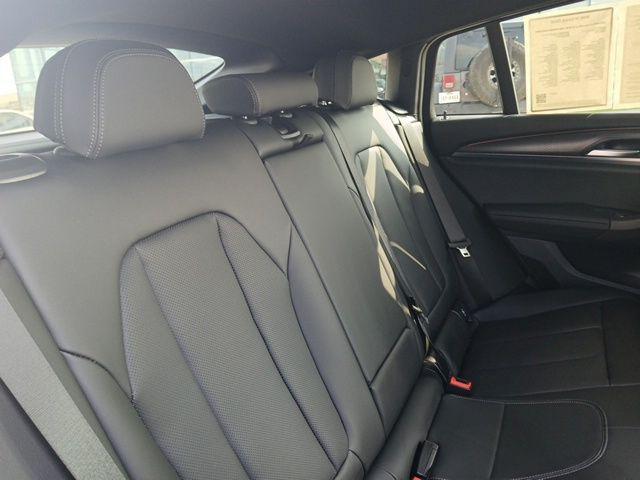 used 2025 BMW X4 car, priced at $57,191