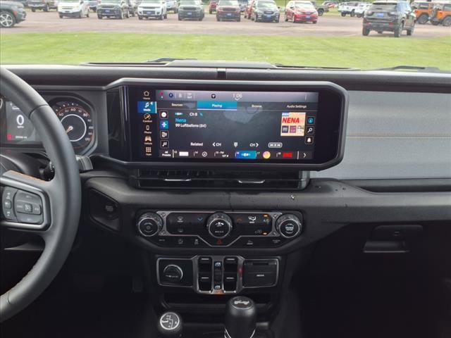used 2024 Jeep Wrangler car, priced at $34,995