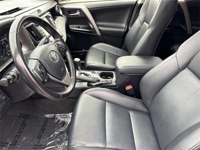 used 2016 Toyota RAV4 Hybrid car, priced at $18,995