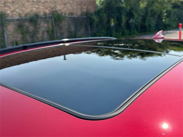used 2024 Genesis GV70 car, priced at $54,995