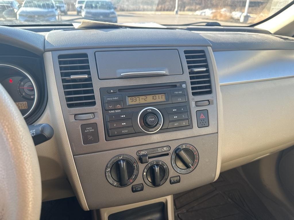 used 2009 Nissan Versa car, priced at $4,995