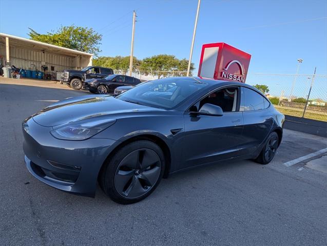 used 2023 Tesla Model 3 car, priced at $27,498