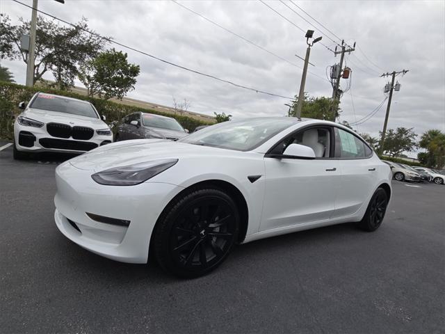 used 2022 Tesla Model 3 car, priced at $27,998