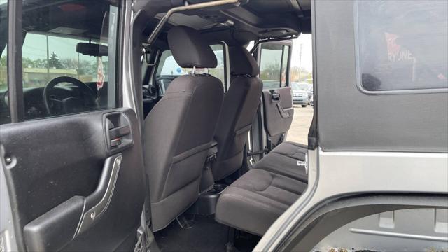used 2014 Jeep Wrangler Unlimited car, priced at $16,495