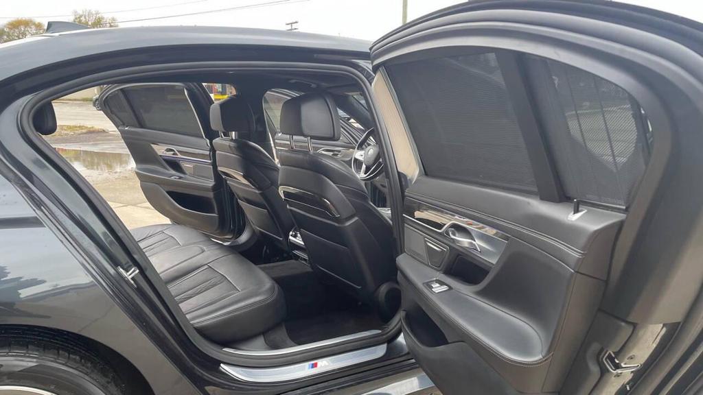 used 2016 BMW 750 car, priced at $16,995