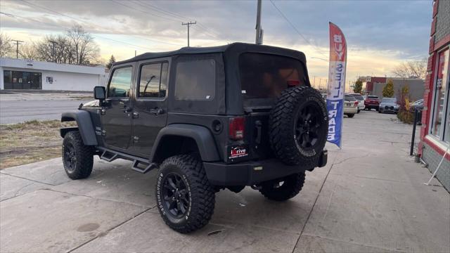 used 2010 Jeep Wrangler Unlimited car, priced at $12,995