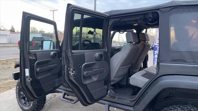 used 2010 Jeep Wrangler Unlimited car, priced at $12,995