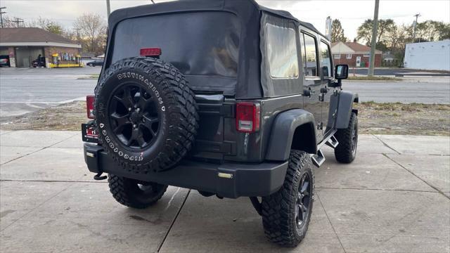 used 2010 Jeep Wrangler Unlimited car, priced at $12,995