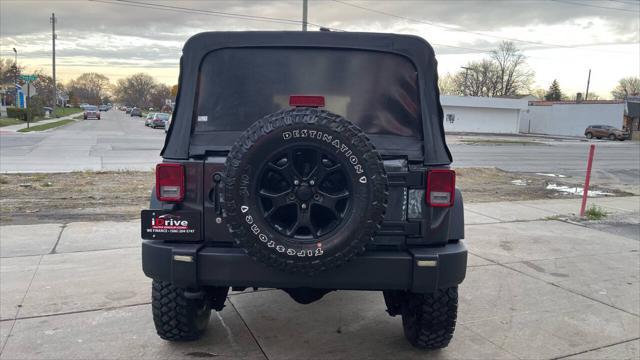 used 2010 Jeep Wrangler Unlimited car, priced at $12,995