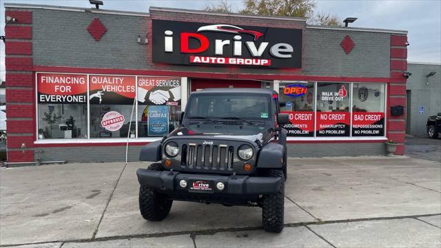 used 2010 Jeep Wrangler Unlimited car, priced at $12,995