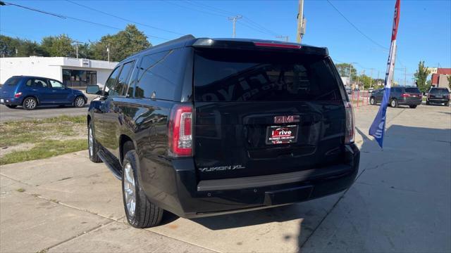 used 2015 GMC Yukon car, priced at $16,895