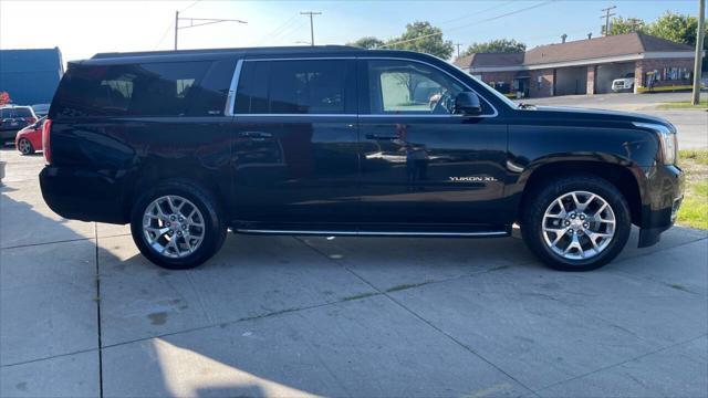 used 2015 GMC Yukon car, priced at $16,895