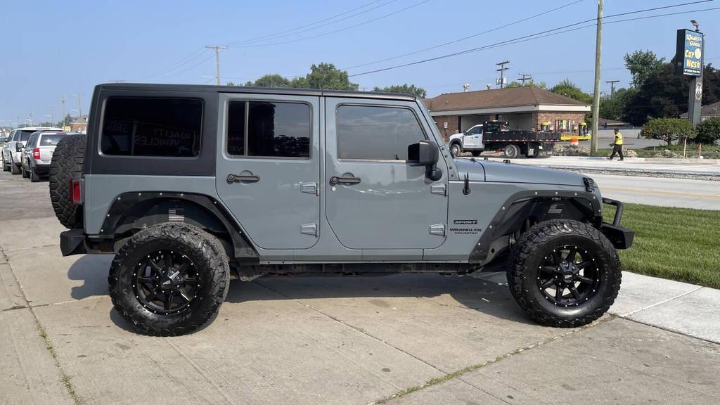 used 2015 Jeep Wrangler Unlimited car, priced at $15,185