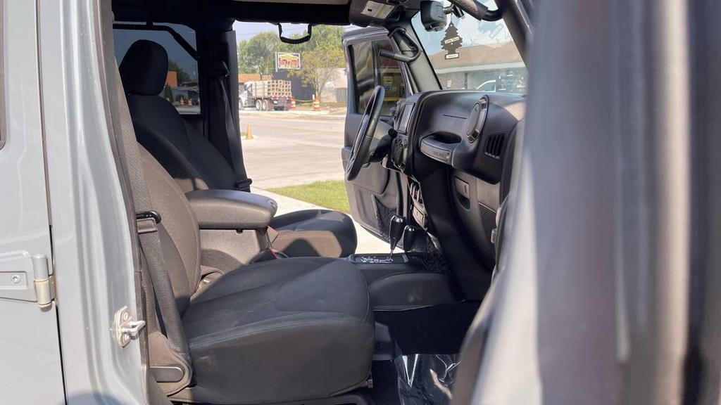 used 2015 Jeep Wrangler Unlimited car, priced at $15,185