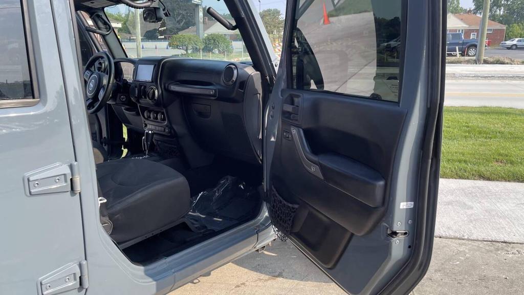 used 2015 Jeep Wrangler Unlimited car, priced at $15,185