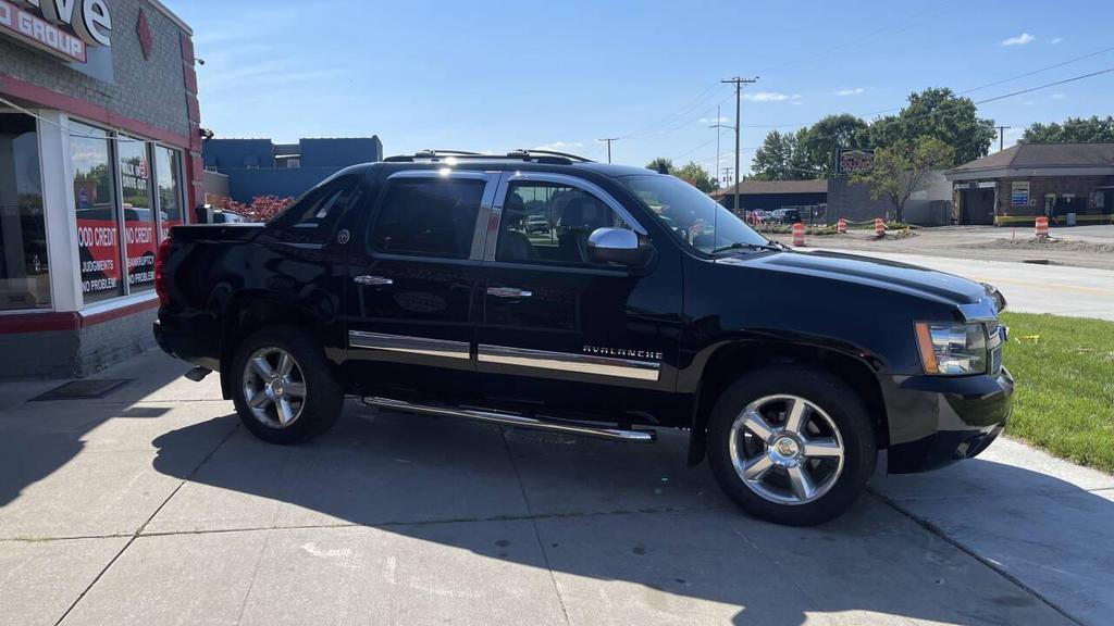 used 2013 Chevrolet Avalanche car, priced at $14,795