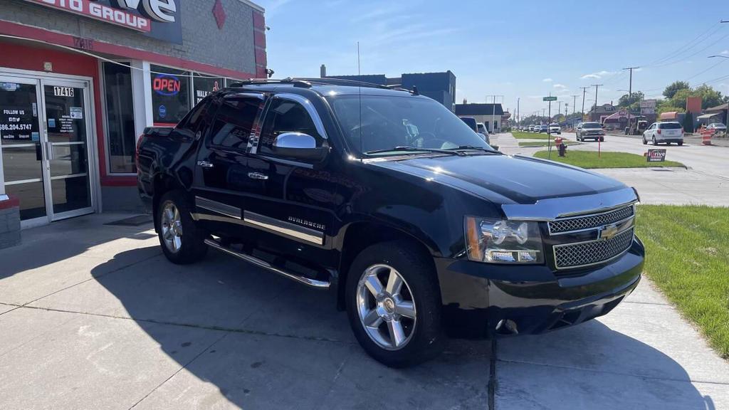 used 2013 Chevrolet Avalanche car, priced at $14,795