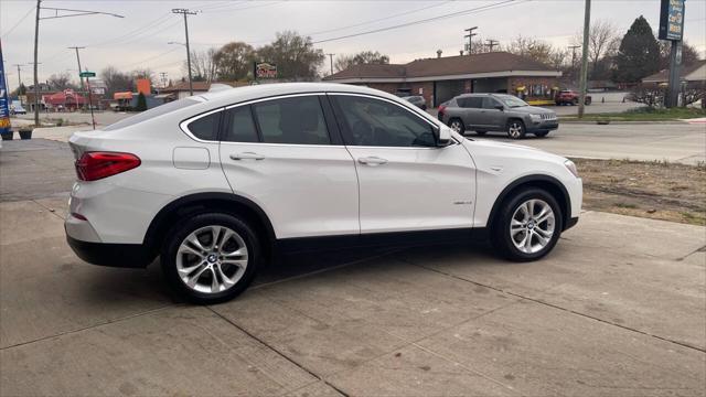 used 2016 BMW X4 car, priced at $14,995