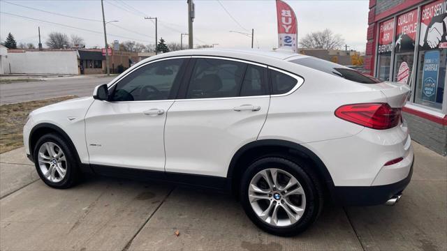 used 2016 BMW X4 car, priced at $14,995