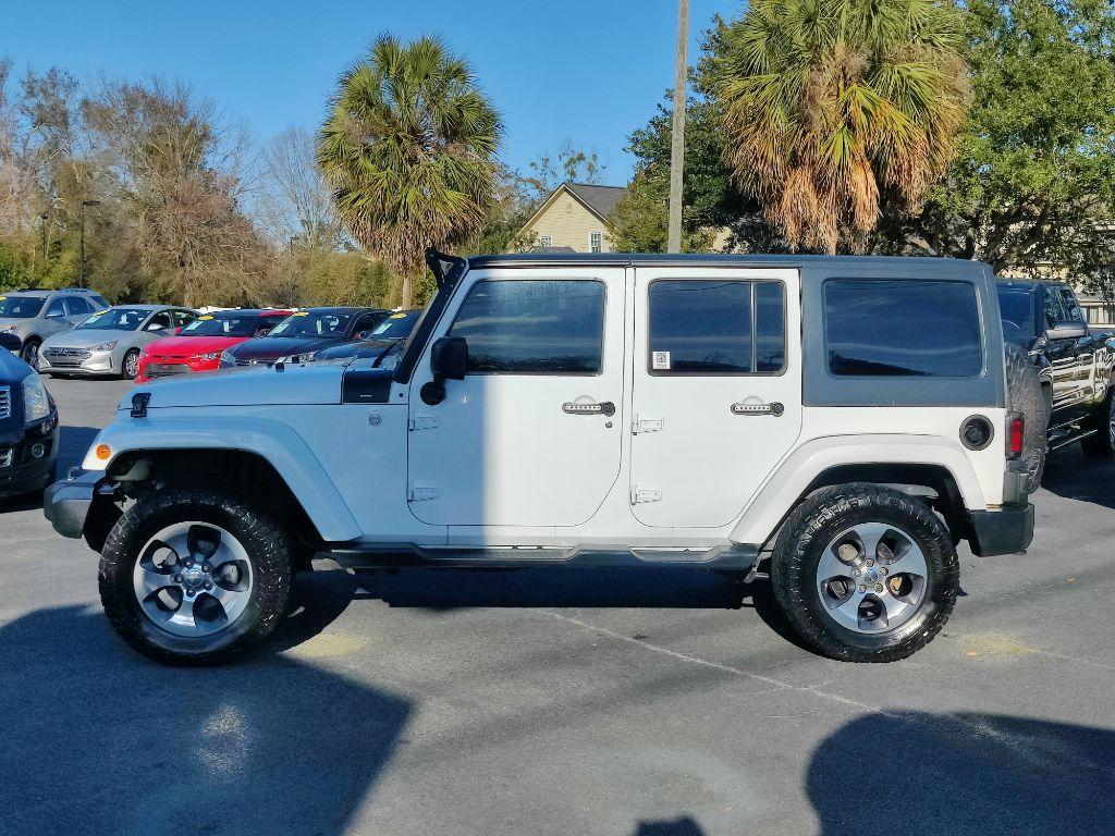 used 2014 Jeep Wrangler Unlimited car, priced at $16,950