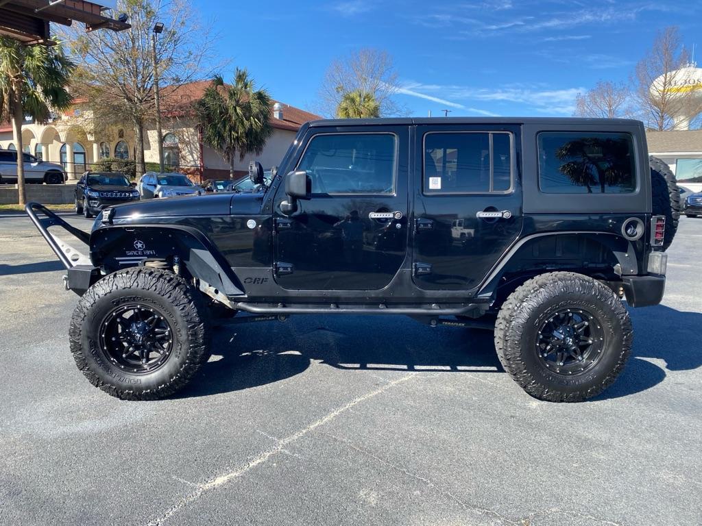 used 2011 Jeep Wrangler Unlimited car, priced at $16,950