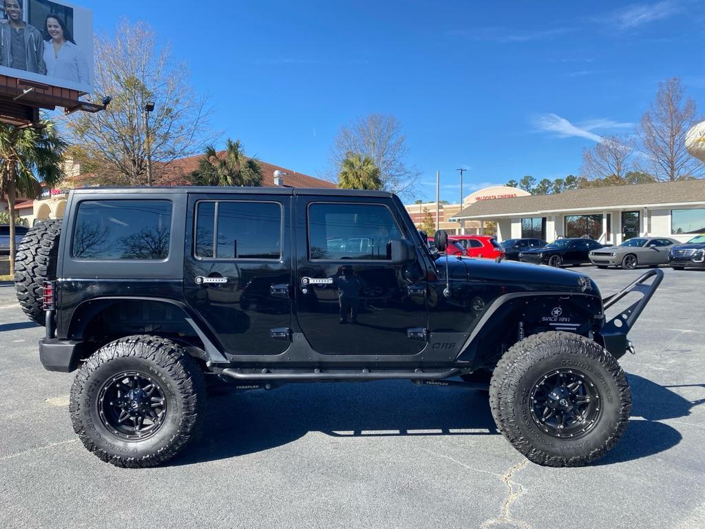 used 2011 Jeep Wrangler Unlimited car, priced at $16,950