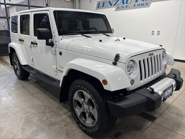 used 2014 Jeep Wrangler Unlimited car, priced at $20,997