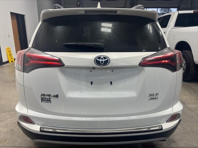 used 2018 Toyota RAV4 car, priced at $13,991