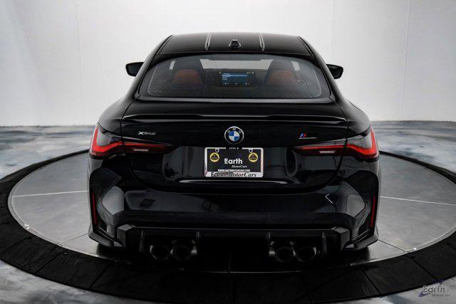 used 2024 BMW M4 car, priced at $83,998