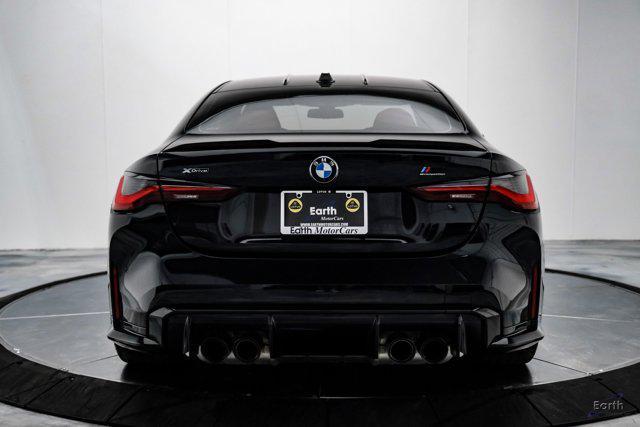 used 2024 BMW M4 car, priced at $83,998