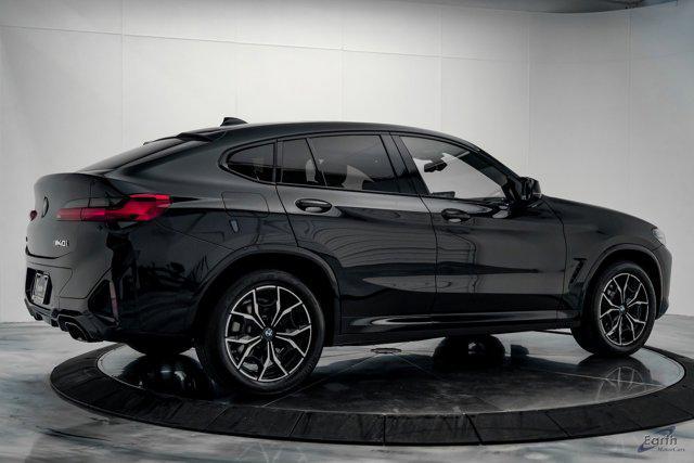 used 2023 BMW X4 car, priced at $62,441