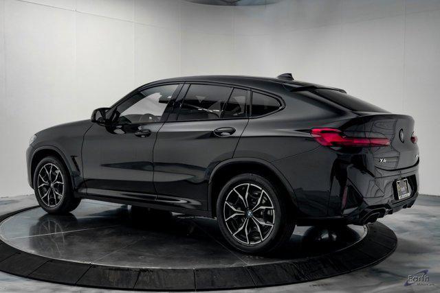 used 2023 BMW X4 car, priced at $62,441