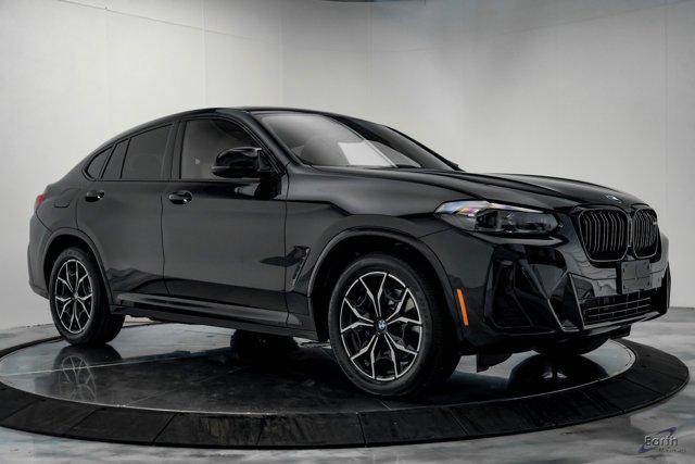 used 2023 BMW X4 car, priced at $62,441