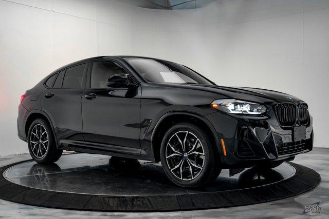 used 2023 BMW X4 car, priced at $62,441