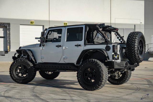 used 2012 Jeep Wrangler Unlimited car, priced at $28,990