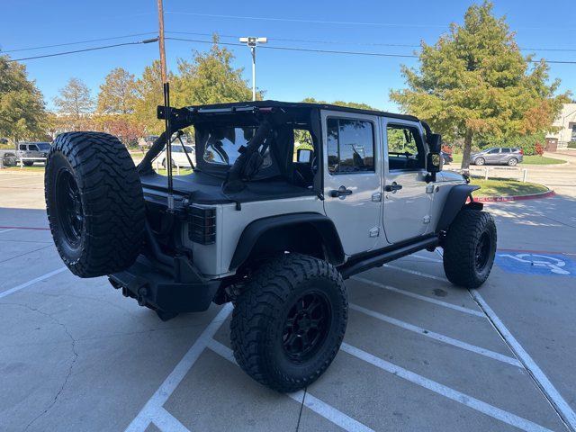 used 2012 Jeep Wrangler Unlimited car, priced at $29,990