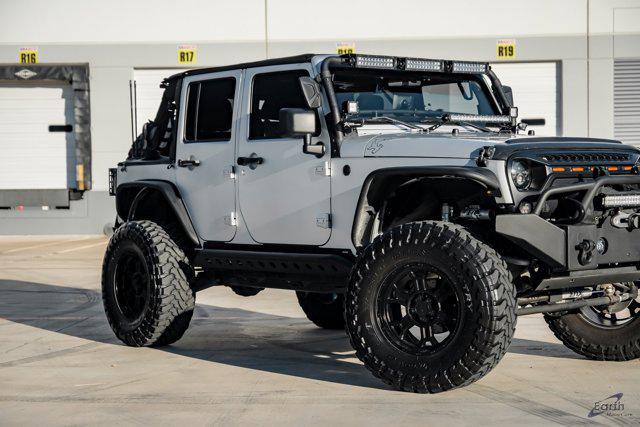 used 2012 Jeep Wrangler Unlimited car, priced at $28,990