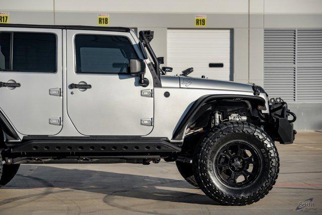 used 2012 Jeep Wrangler Unlimited car, priced at $28,990