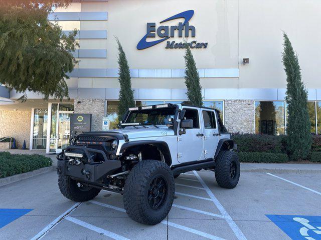 used 2012 Jeep Wrangler Unlimited car, priced at $29,990