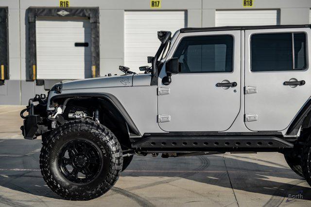 used 2012 Jeep Wrangler Unlimited car, priced at $28,990