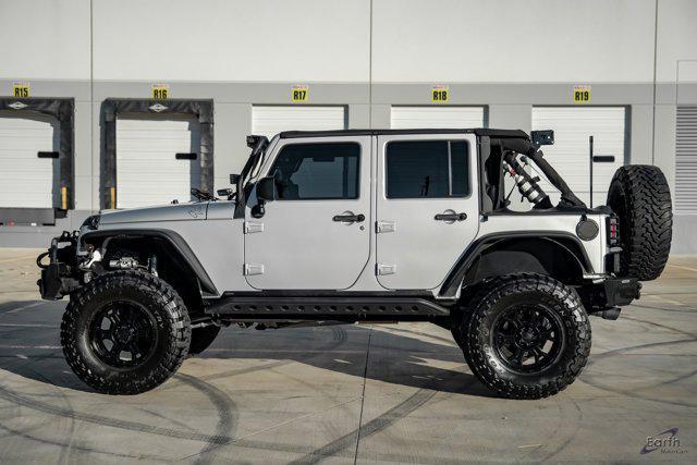 used 2012 Jeep Wrangler Unlimited car, priced at $28,990