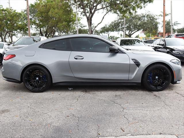 used 2023 BMW M4 car, priced at $74,490