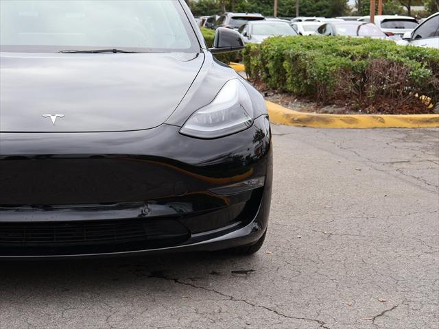 used 2022 Tesla Model 3 car, priced at $28,690