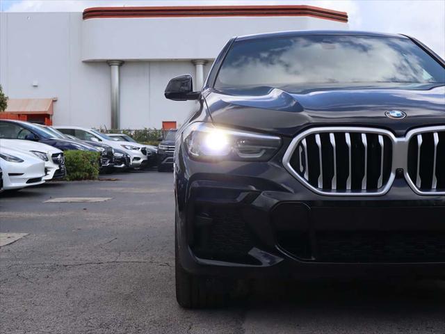 used 2023 BMW X6 car, priced at $54,690