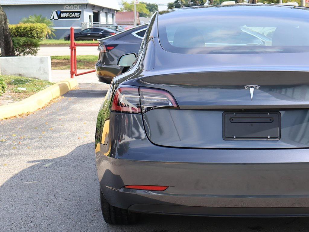 used 2023 Tesla Model 3 car, priced at $23,495