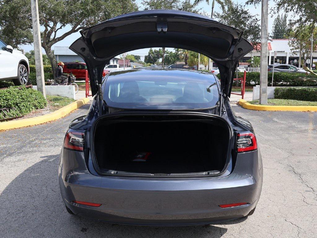 used 2023 Tesla Model 3 car, priced at $23,495