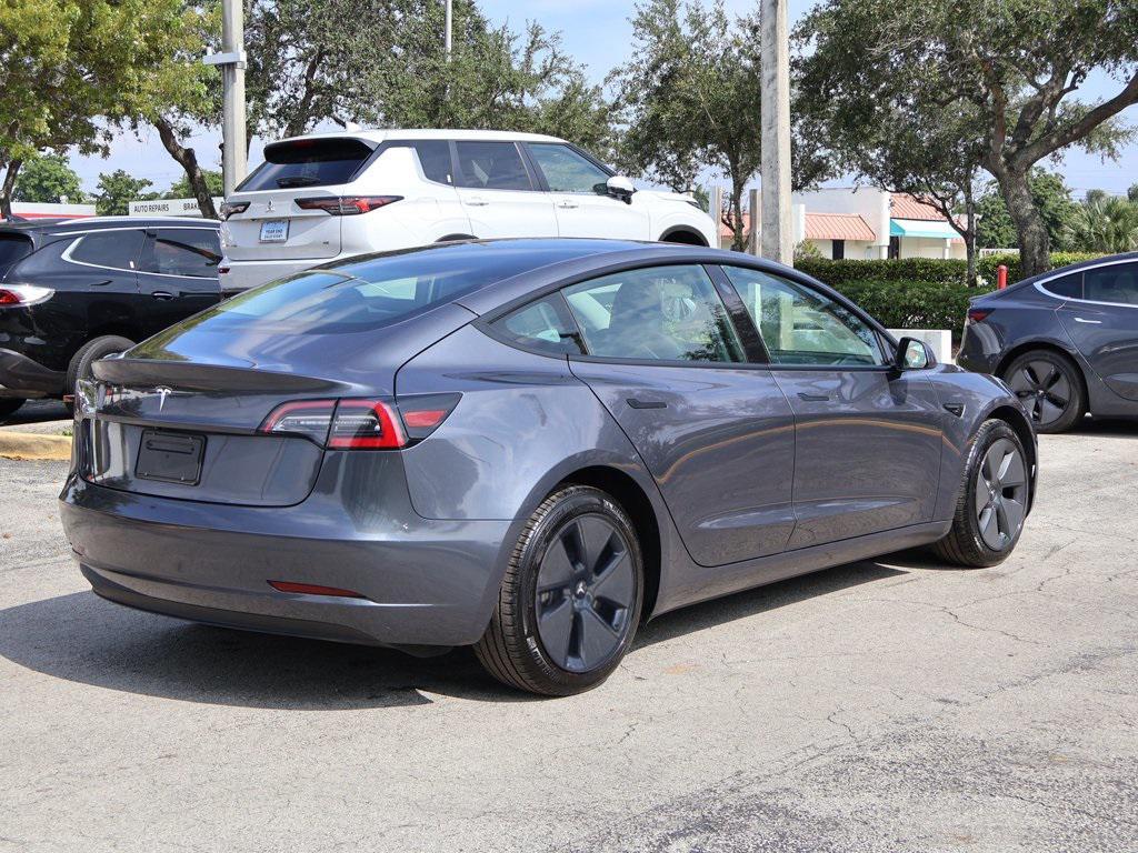 used 2023 Tesla Model 3 car, priced at $23,495