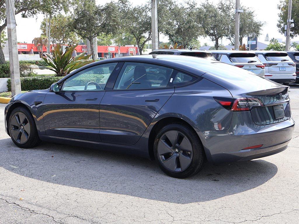 used 2023 Tesla Model 3 car, priced at $23,495